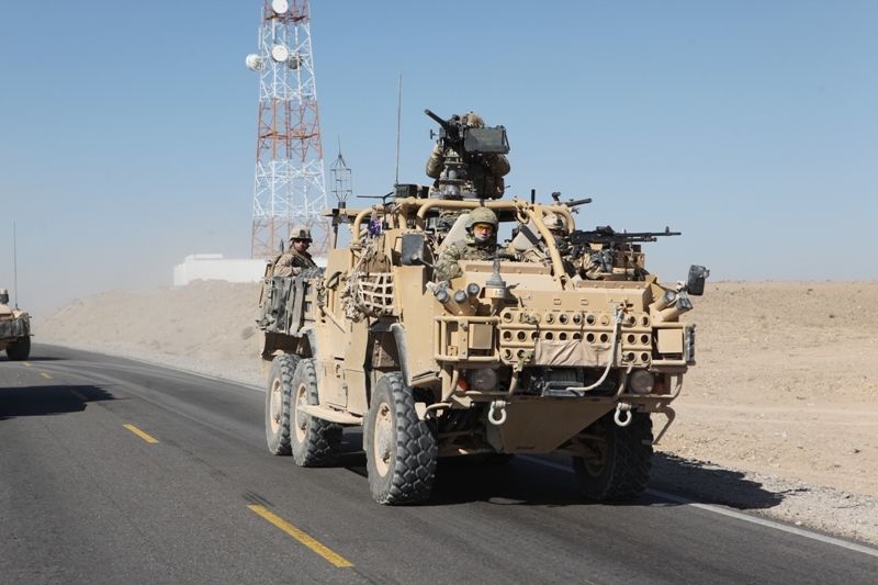 U.S. Marine Corps Maj. Gen. Richard P. Mills, the commander of Regional Command Southwest (RC SW); and Sgt. Maj. Michael Barrett, the sergeant major of RC SW, travel to Maiwand, Afghanistan, Jan. 26, 2011, to receive updates on road construction and security operations. They also traveled to Lashkar Gah in Helmand province to meet with Helmand province Gov. Gulab Mangal and other Afghan leaders in support of the International Security Assistance Force. (U.S. Marine Corps Cpl. Timothy P. Chesnavage/Released)