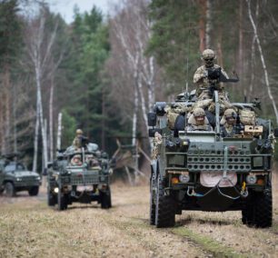 Jackal 2 Armoured Fighting Vehicles and a Panther patrol vehicle drive through wooded area on exercise. Light Dragoons train with US 2nd Cavalry in Germany before eFP deployment to Poland. Soldiers from the Light Dragoons Regiment have been making final preparations with the U.S Army 2nd Cavalry Regiment (2CR) in Germany. The United States is taking the lead role in NATO's enhanced Forward Presence (eFP) deployment to Poland. The UK, who has the lead role in NATO's eFP Estonia is also contributing to eFP Poland, as around 150 troops from the Light Dragoons regiment Based in Catterick, as well as a number of armoured vehicles, will travel with the U.S. 2CR to Orzysz in north east Poland. Photographer - Mr Dominic King - Army Press Office Germany Info; The Light Dragoons are a Light Cavalry Regiment in the Adaptive Force. As the name suggests, Light Dragoons were originally Light Cavalry mounted on fast horses, able to move quickly across the battlefield. Today, mounted on Jackal Fighting Vehicles, the light nature of the Regiment means they are able to deploy anywhere in the world at very short notice. In 2014 the Regiment changed from Formation Reconnaissance, on the Combat Vehicle Reconnaissance (Tracked) family of vehicles, to Light Cavalry on the Jackal and Coyote wheeled platform. This has seen the unit move into a new role, deploying regularly on overseas training missions across North Africa. The Light Dragoons remains an agile reconnaissance asset quickly deployable to any part of the world as one of three Light Cavalry units across 1st (United Kingdom) Division. With a history to match any regiment across the British Army, The Light Dragoons continues to prove itself on active operations around the world as one of the foremost mounted reconnaissance units. Deployment at the forefront of NATO’s Enhanced Forward Presence under the United States’ 2nd Cavalry Regiment marks the next chapter in their illustrious history. NATO enhanced Forward Pr