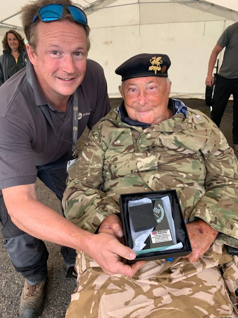 Toby receiving Plaque from Graham at Motorsport Endeavour