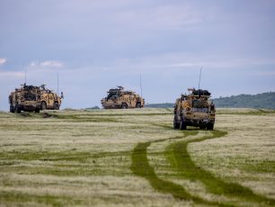 Following a dawn Raid, soldiers from 3 Rifles conduct kit administration overlooking the Carpathian Mountains of Romania. The 3rd Battalion the Rifles (3 RIFLES) are deployed on Exercise NOBLE JUMP in Romania, which is part of a wider exercise called Exercise Defender 21. The Support and Headquarters Companies of 3 RIFLES are at Cincu Training Area, Romania, to partner with the UKs NATO Allies. 3 RIFLES are working alongside the 66th Turkish Brigade, as well as elements of the Italian and US Armies. The Exercise will see the soldiers of different nationalities conduct interoperability training together, as well as live fire ranges. Despite COVID restrictions, the Army is still conducting demanding training overseas, with covid 19 precautions in place. All personnel deployed had to have proof of a negative PCR covid test 72 hours before deployment.